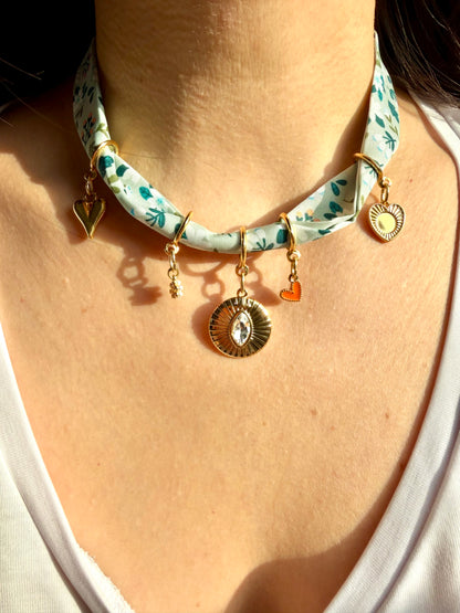 Green charm bandana with floral pattern • Gold heart pendant &amp; crystal