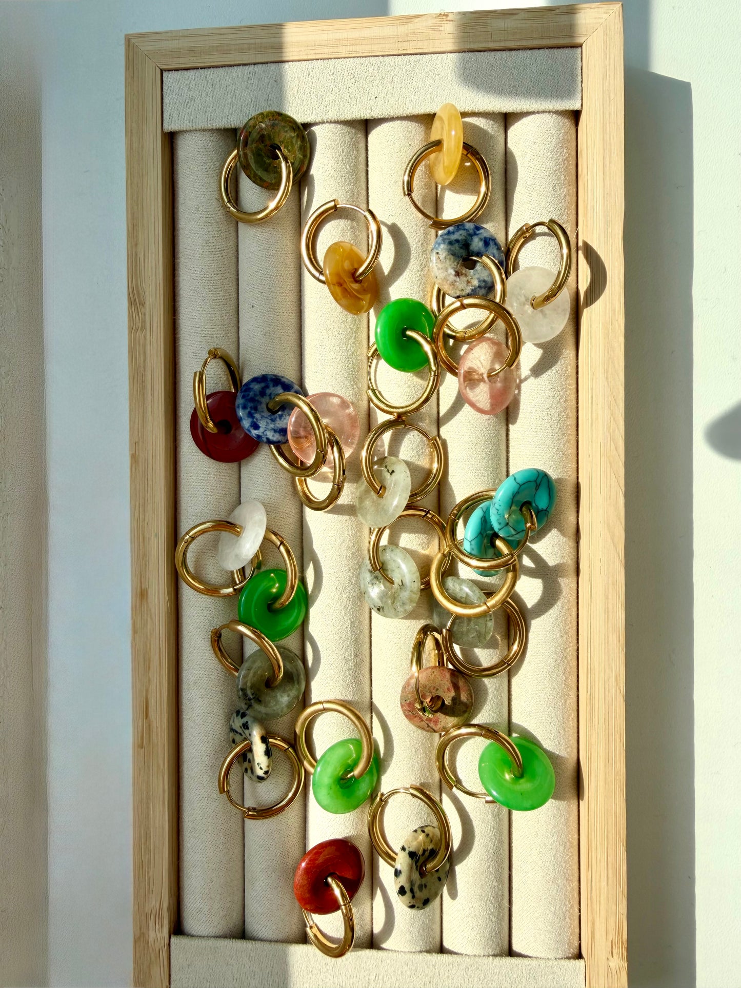 Stone Circle – Gold-plated hoop earrings with natural stone donut pendants – handmade