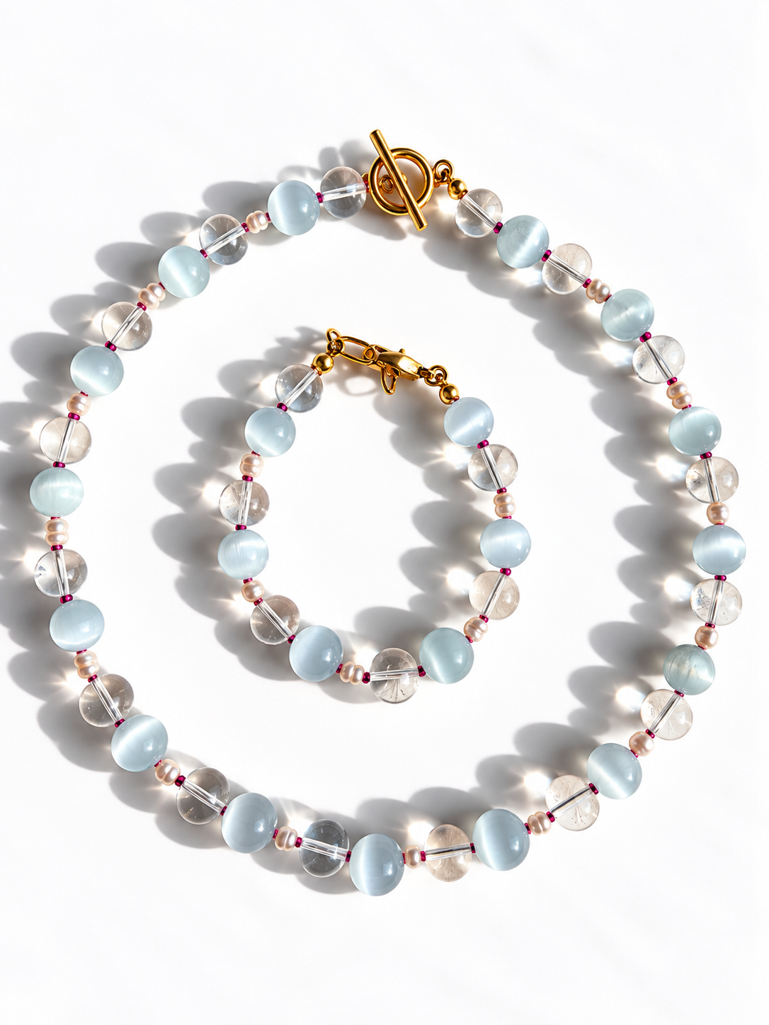 Crystal Sky – Schmuck mit Bergkristall, Katzenauge und Süßwasserperlen